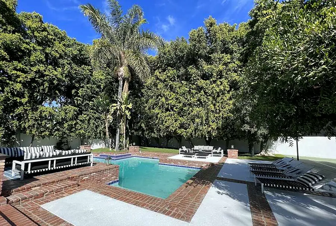 Pool surrounded by palms, Encino