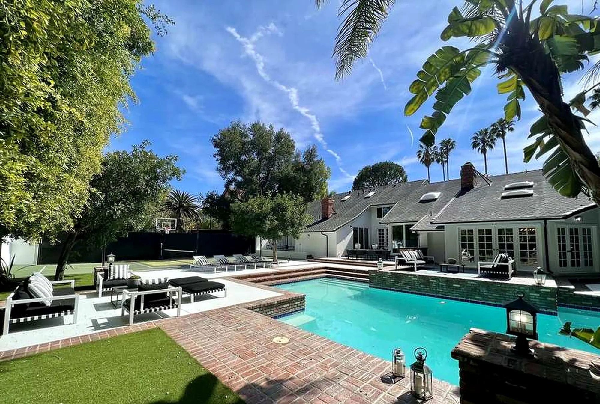 Backyard pool and spa with lounge terrace in Encino